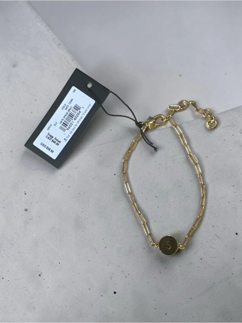 kate spade Gold Paperclip Bracelet with 'S' Disc comes with dust bag. - Picture 1 of 2